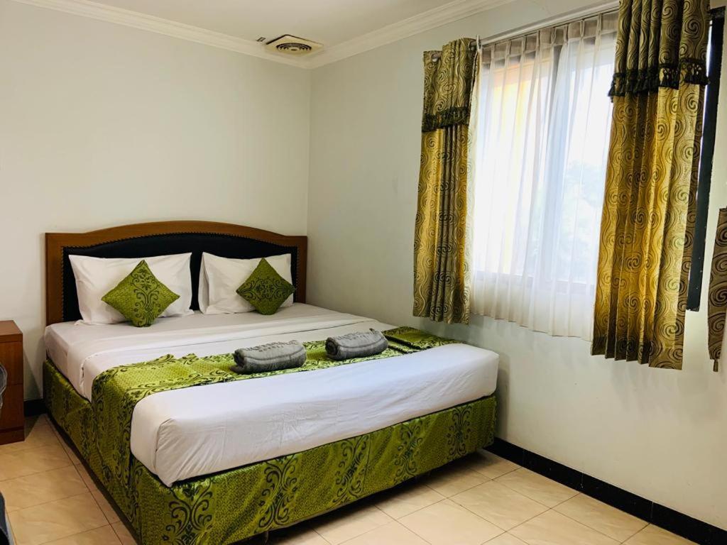 Karsa Utama Hotel Jakarta Extérieur photo